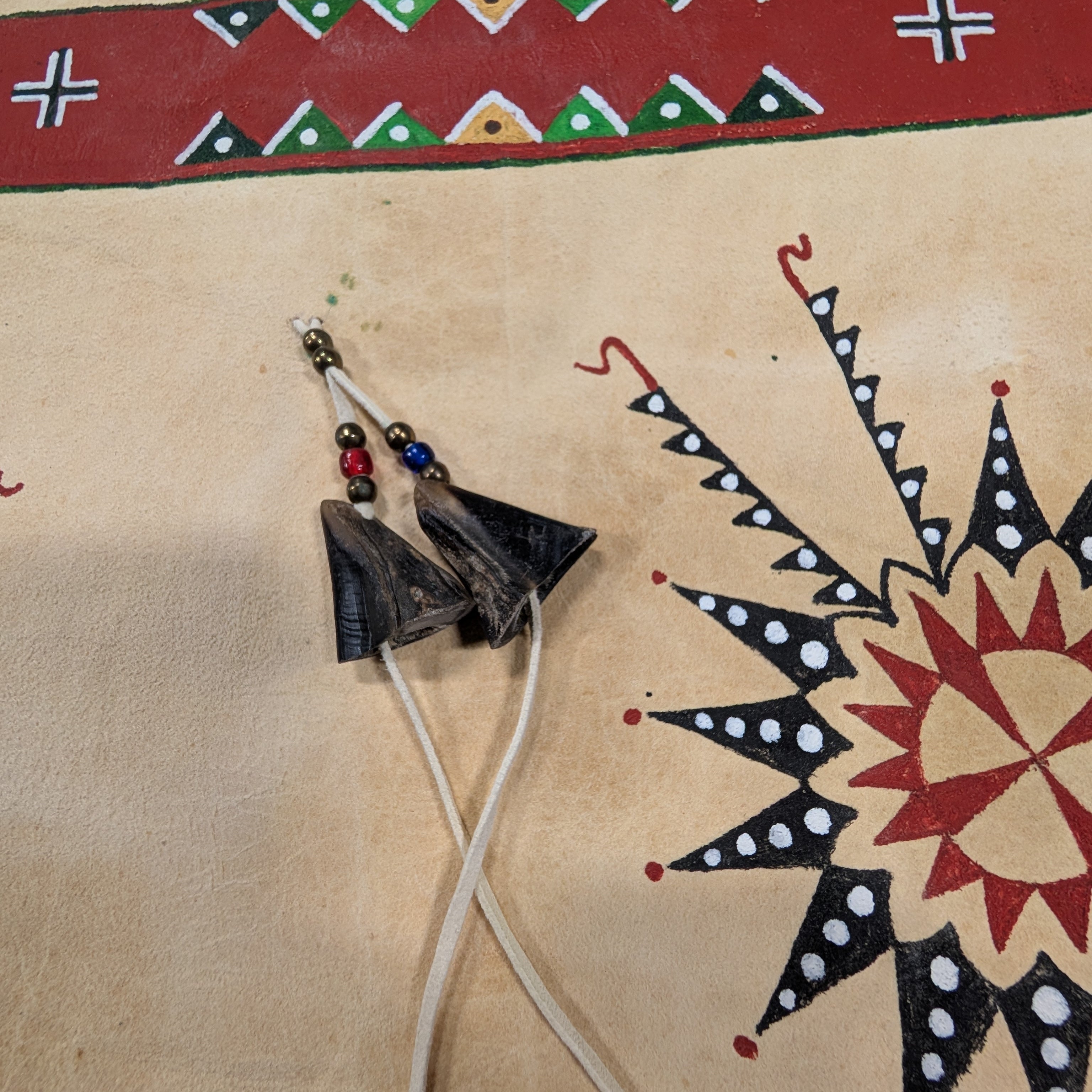 Native American traditional painting on deer hide with fur/hair