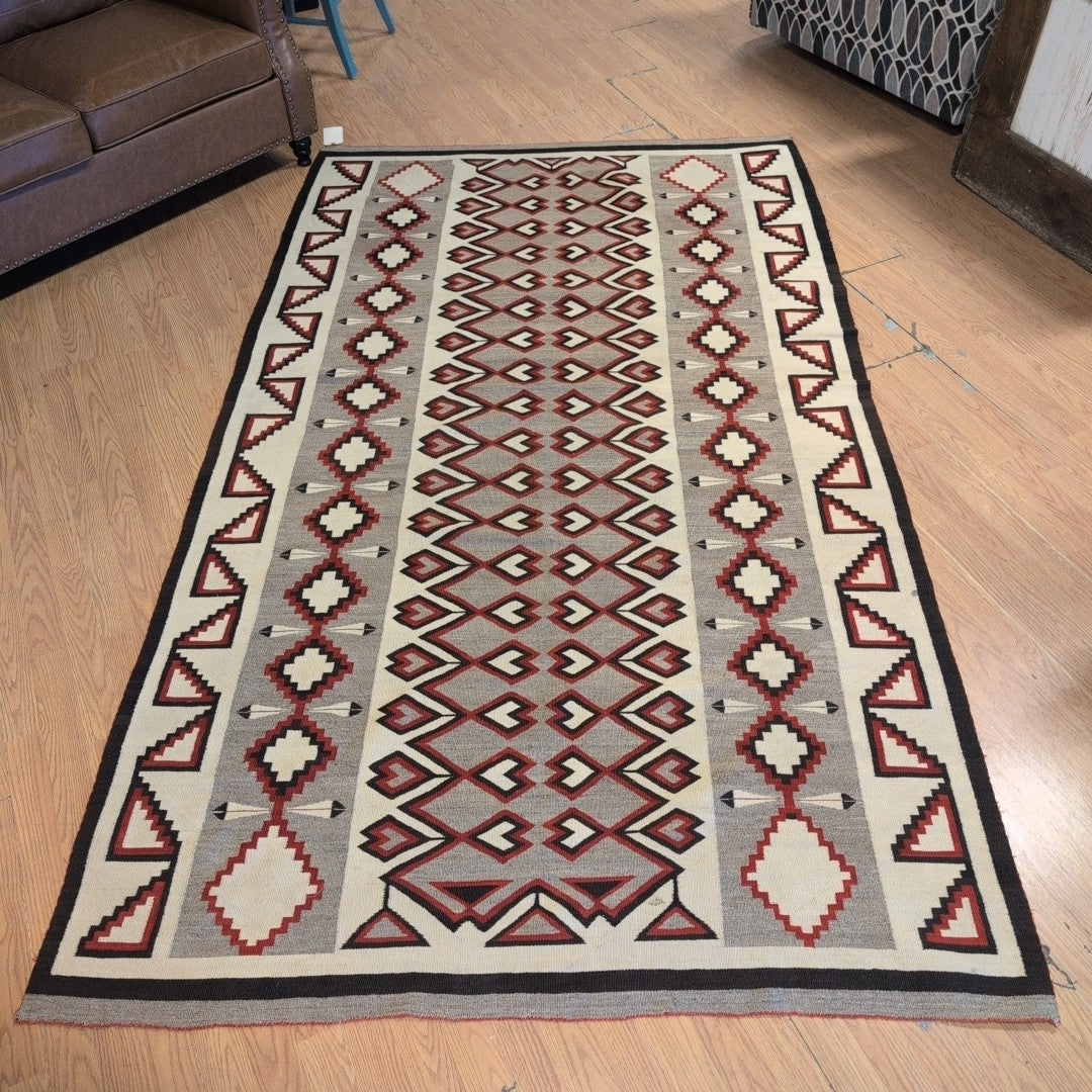 8'4" x 4'10" Feathers Navajo Ganado Wool Rug