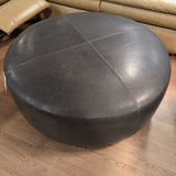 Universal U Choose Round Gray Leather Ottoman