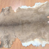 Native American traditional painting on deer hide with fur/hair